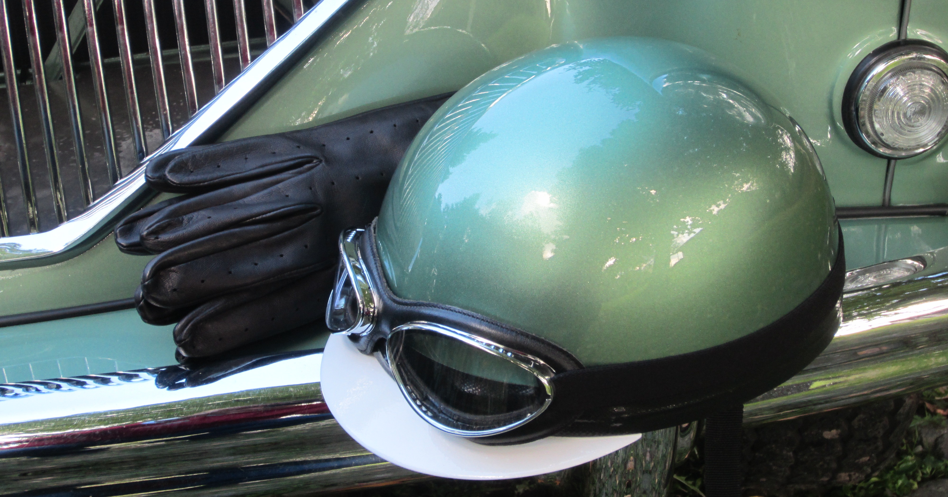 vintage driving goggles and hat